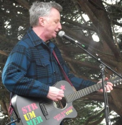 Singer Billy Bragg performing at the Tuition fees demo in Taunton