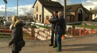 Cllr Mick Lerry showing Ed Miliband around the Somerset Levels during the floods.